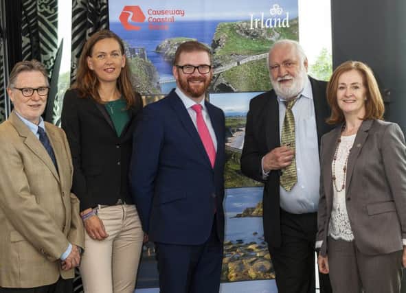 Mr Hamilton with Finola OMahony of Tourism Ireland, right, and representatives of the German travel industry