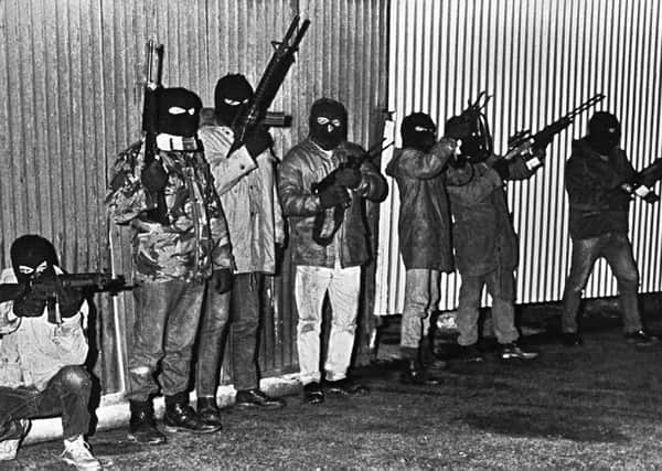 Dessie O'Hare was a notorious member of the border INLA, seen here with new automatic guns in 1986. A year later he kidnapped Dublin dentist Dr John O'Grady