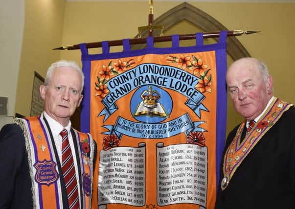 Edward Stevenson, right, Grand Master of the Grand Orange Lodge of Ireland, and Hugh Stewart, Grand Master of the County Londonderry Grand Orange Lodge, pictured at the Service of Unveiling and Dedication of the County Londonderry Grand Lodge Memorial Bannerette in St. LurachÃ¢Â¬"s Church, Maghera.