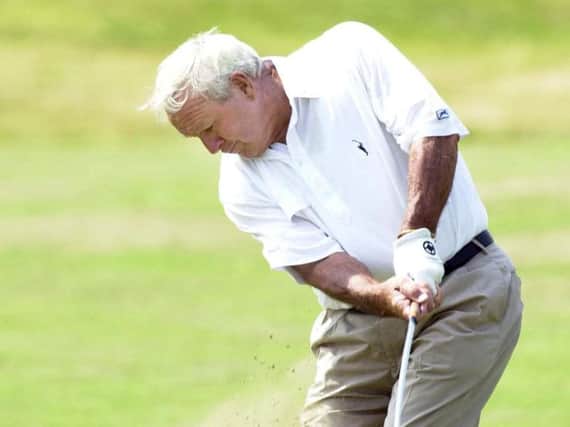 Arnold Palmer playing Royal County Down in 2001. Photo: Pacemaker