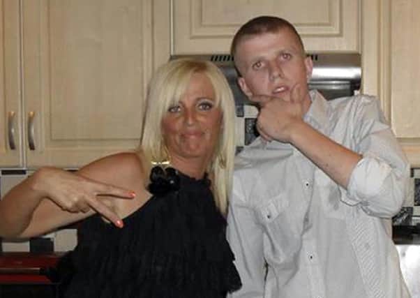 Sean Paul Carnahan with his mother Tracy Carnahan,