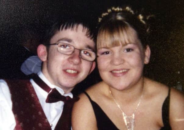 Postal worker Daniel McColgan who was shot dead at Newtownabbey postal sorting office in the early hours of this morning. Daniel is pictured here with his girlfriend Lyndsey Milliken.