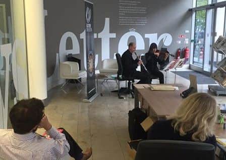 Members of the Ulster Orchestra performing in the News Letter office in Belfast