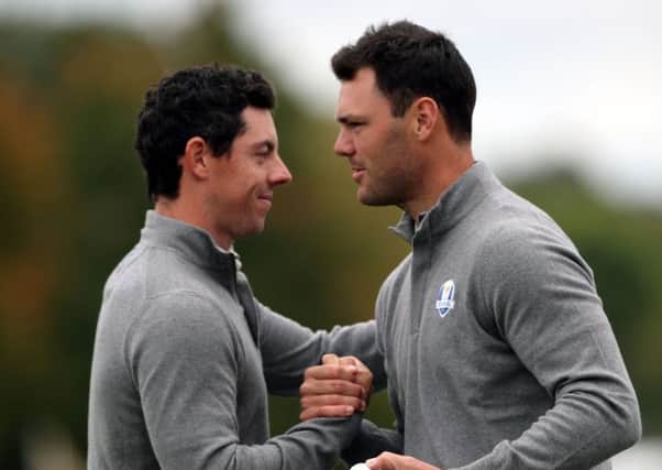 Europe's Rory McIlroy (left) and Martin Kaymer embrace during a practice session ahead of the 41st Ryder Cup