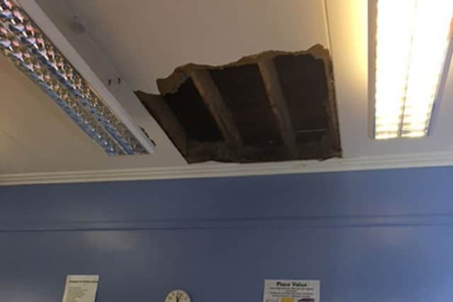 A huge hole left in the roof of a classroom at Killyleagh PS when part of the ceiling collapsed.
