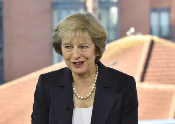 For use in UK, Ireland or Benelux countries only 
EDITORIAL USE ONLY
Handout photo issued by the BBC of Prime Minister Theresa May appearing on the BBC One current affairs programme, The Andrew Marr Show in Birmingham. PRESS ASSOCIATION Photo. Picture date: Sunday October 2, 2016. Britain looks set to leave the European Union by summer 2019 after triggering the formal process to pull out before the end of March next year, Theresa May has said. See PA story TORY Main. Photo credit should read: Jeff Overs/BBC/PA Wire 

NOTE TO EDITORS: This handout photo may only be used in for editorial reporting purposes for the contemporaneous illustration of events, things or the people in the image or facts mentioned in the caption. Reuse of the picture may require further permission from the copyright holder.