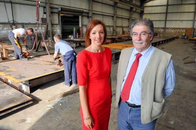 Woodburn Engineering MD Tony Cowan pictured with Moira Loughran of Invest NI