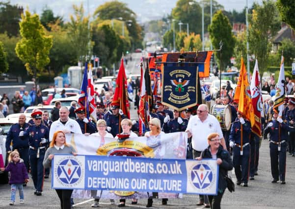 The return parade makes its way past the Ardoyne shops towards the finishing point on Saturday. Picture - Kevin Scott / Presseye