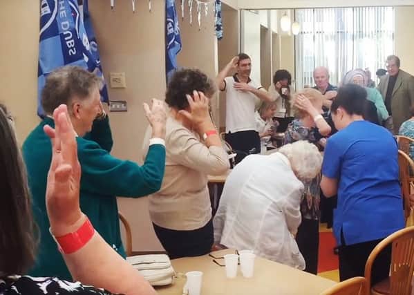 Screengrab taken from You Tube of a patient and staff flash-mob dancing to the Macarena in the canteen at Our Lady's Hospice in Harold's Cross in Dublin