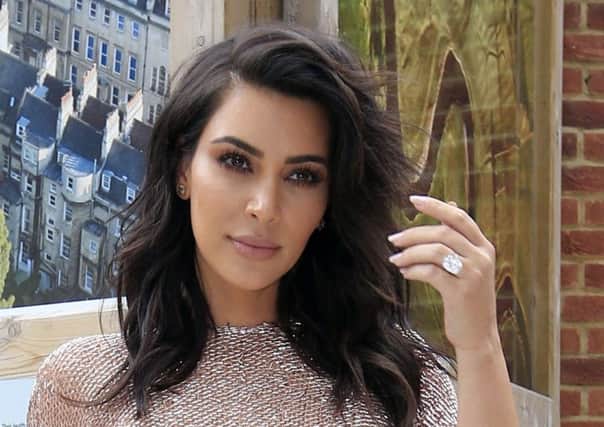File photo dated 21/05/16 of Kim Kardashian West as thieves who robbed her  at gunpoint were targeting possessions seen on social media
