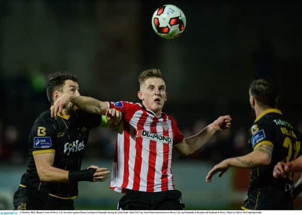 Goalscorer, Ronan Curtis of Derry City in action against Brian Gartland of Dundalk during the Irish Daily Mail FAI Cup Semi-Final match between Derry City and Dundalk at Brandywell Stadium in Derry. Photo by Oliver McVeigh/Sportsfile