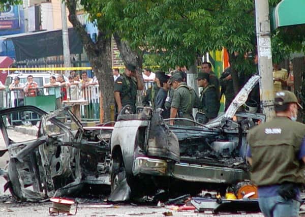 Police in Colombia said there had been a "quantum leap" in Farc's bombing techniques after training by the IRA. Here, a leftist rebel bomb destroyed a car at Neiva in 2007, killing four police officers.
