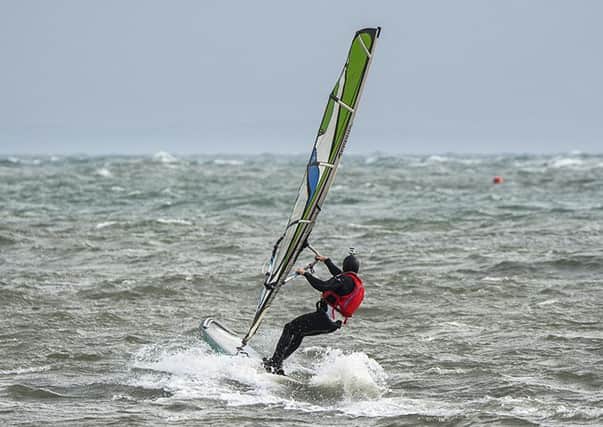 Image of John Bedford windsurfing during the challenge on Wednesday, October 5, 2016