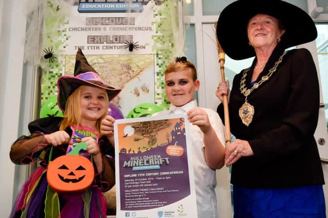 Mayor Audrey Wales gets into the spirit of the Minecraft Spooktacular with local youngsters Joel and Ellie. (Submitted Pic).