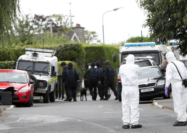 The security forces pictured carrying out anti-terror searches in Lurgan in September 2016. A Conservative MP has said that terrorism is equal to obesity in terms of the threat it poses to the UK.