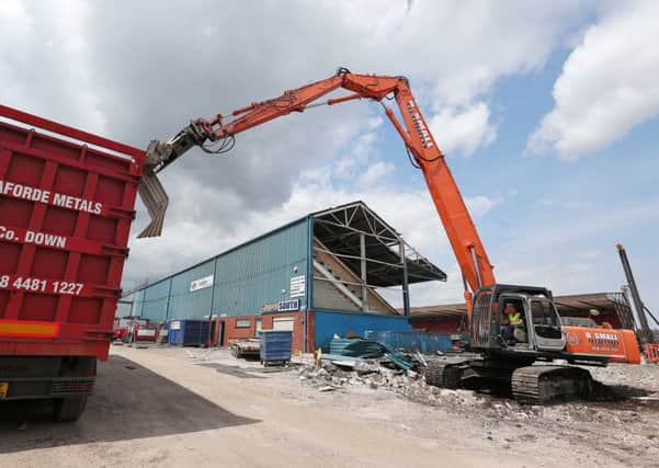 Demolition begins of the 100-year-old South stand in June 2014