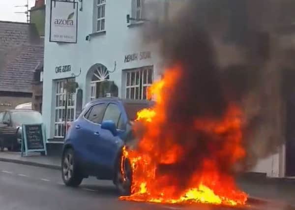 A car caught fire in Hillsborough village on Friday.