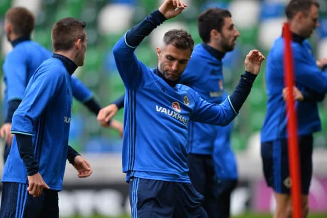 Aaron Hughes and the Northern Ireland players get used to their new surroundings.  Pic Colm Lenaghan/Pacemaker