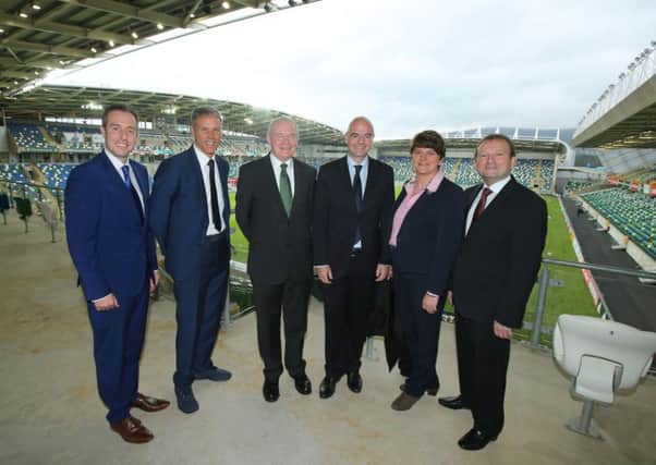First Minister Arlene Foster and Deputy First Minister Martin McGuinness are pictured with Communities Minister Paul Givan, Marco Van Basten, FIFA President, Gianni Infantino and Irish FA President, David Martin before the official opening ceremony at Windsor Park.