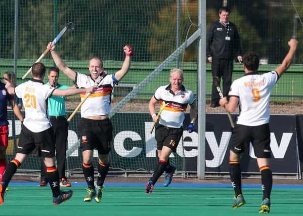 Banbridge's Eugene Magee (second from left) celebrates after scoring to make it 1-0 agaisnt Belgium's Royal Leopold. 
The game finished 3-3
