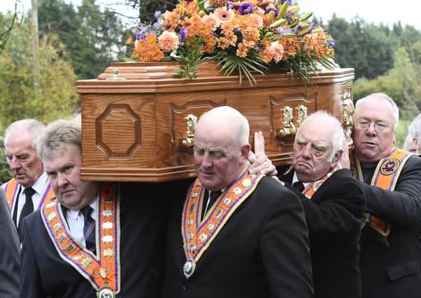 Orange Order Grand Master Edward Stevenson (second left) was one of a number of leading figures from the Institution to carry the remains of Drew Nelson