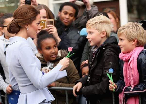 The Duchess of Cambridge greets well-wishers during a visit to the De Bouwkeet Work Space in Rotterdam, the Netherlands