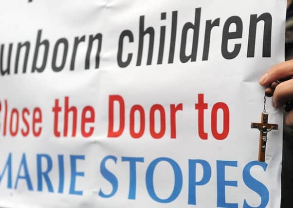 The woman had been involved in prayer vigils outside the Marie Stopes centre in Belfast