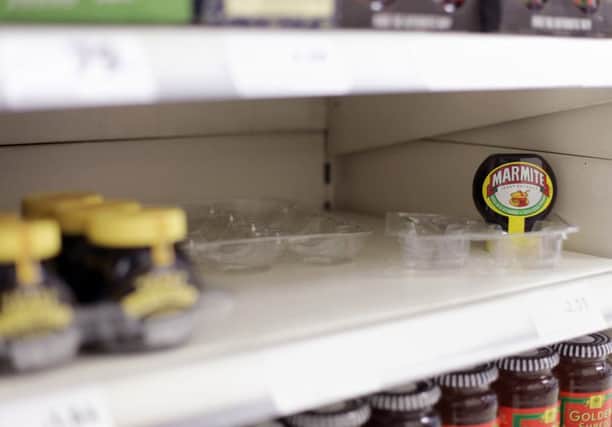 A solitary jar of Marmite sits on a Tesco shelf as the row developed