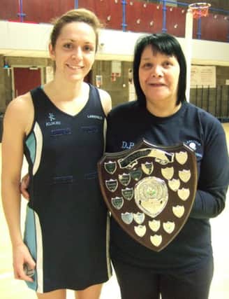 Caroline O'Hanlon (captain) and Denise Prue (coach) of last season's double winners Larkfield who start their title defence tomorrow night against newly-promoted Westside.