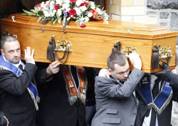 Ryan Bairds coffin is carried out of Magheramorne Presbyterian church after the funeral service