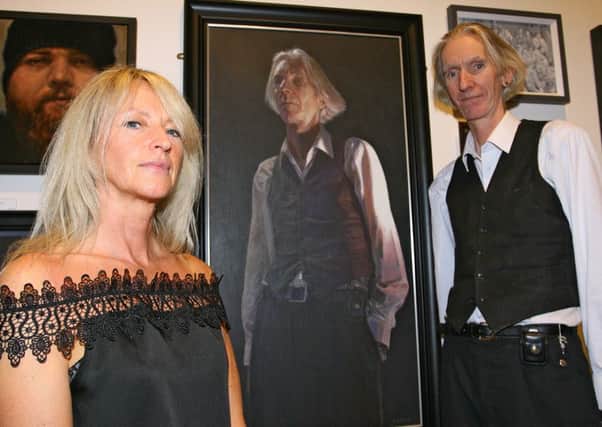 Wexford artist Jackie Edwards with her painting entitled Return of the thin white Dub, with Tony Strickland