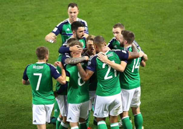 The Northern Ireland team celebrating a goal against San Marino in a World Cup qualifying match last month