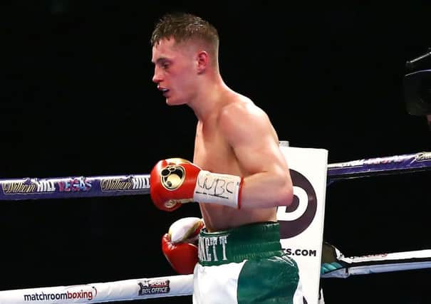 Belfasts Ryan Burnett defended his British title on Saturday night