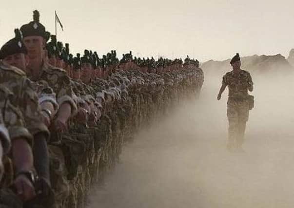 Captain Doug Beattie marching the Royal Irish Battalion on parade on St Patrick's Day 2003 just before the Iraq invasion