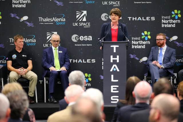 First Minister Arlene Foster speaks at the launch ceremony at Thales accompanied on the platform by Major Tim Peake, Thales general manager Philip McBride and Economy Minister Simon Hamilton