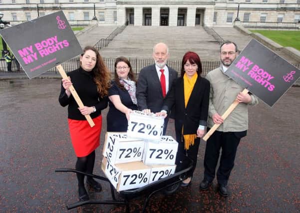 A 45,000-strong petition calling for abortion law reform in Northern Ireland was brought to the steps of Stormont by Amnesty International.