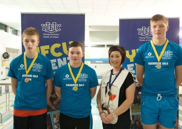 The finalists in the Under 18 Male category pictured with YFCU President Roberta Simmons. (L-R) Timmy Hill, Lisnamurrican YFC (3rd), Josh Erwin, Glarryford YFC (1st) and Robbie Sproule, Derg Valley YFC (2nd).