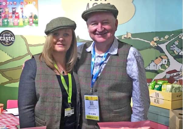 Food and Farming Minister Michelle McIlveen pictured at the SIAL global food exhibition in Paris with Mark McKeever, originally from Co Armagh, on the Ten Acre hand cooked crisps and popcorn exhibit.