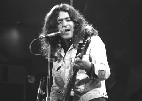 Rory Gallagher in concert at the Ulster Hall, Belfast.