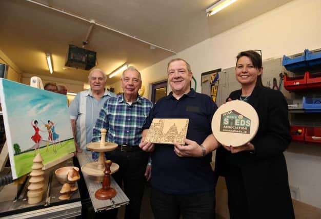Bill Burrows, Ben Hopkins and Billy McCord with co-ordinator Geraldine Nelson at the North Belfast's Men's Shed.
