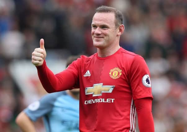 Wayne Rooney is optimistic about Manchester United's chances of bringing the Premier League title back to Old Trafford.