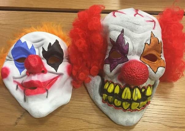 "Whos laughing now?
" photographs of clown masks posted online by the PSNI after making three arrests in Armagh.