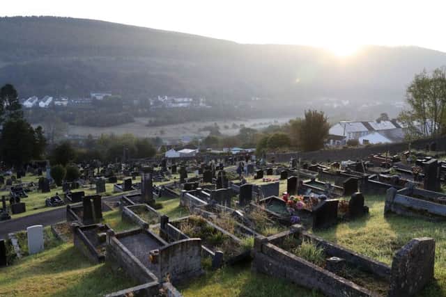 The graves of the victims of the Aberfan disaster in the village's cemetery in Wales, on the 50th anniversary of the tragedy