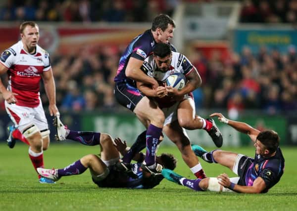 Ulster's Charles Piutau is tackled by the Exeter Chiefs' Ian Whitten, Henry Slade and Dave Lewis