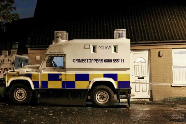 Detectives from the Major Investigation Team revisit the home of murder victim Joe Reilly in the early hours of Sunday morning in the Glenwood Court area of Poleglass, west Belfast. (Photo by Kevin Scott / Presseye)