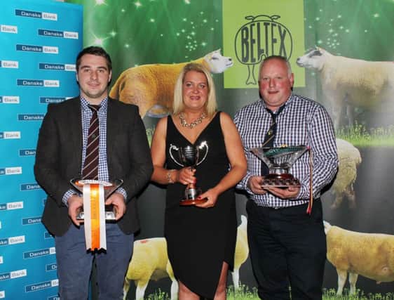 The Overall Champion Flock title went to Wade and Alison McCrabbes Ardstewart Flock, Raphoe, Donegal. Pictured with Wade and Alison and the various awards picked up on the night is judge, Ali Jackson from Annan in Scotland.