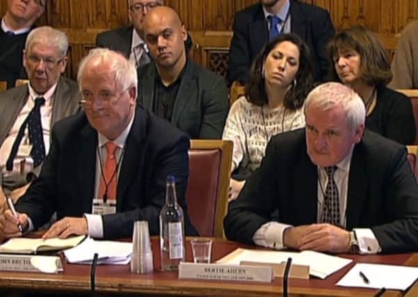 John Bruton (left) and Bertie Ahern give evidence to the committee at Westminster yesterday
