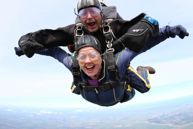 Amy Clark Kennedy, 36, a land agent with Bell Ingram in Ayr, undertook the 13,000ft drop at Beccles in Suffolk