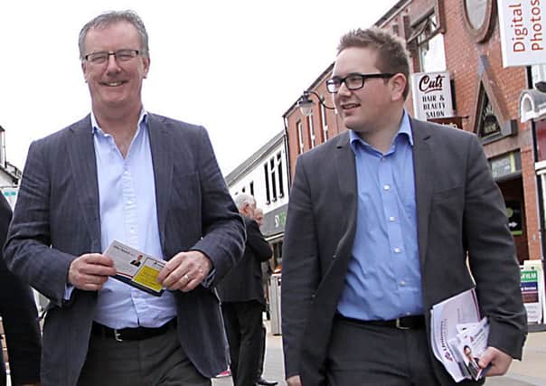 Aaron Callan, right, campaigning with Mike Nesbitt in Limavady