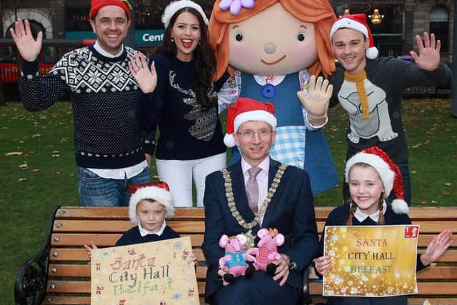 Lord Mayor Brian Kingston is joined by Lily of Lilys Driftwood Bay, the Cool FM Breakfast Team and Corey Courtney and Lauren Picking from Springfield PS at the launch of the Christmas Lights Switch-on in Belfast. The top family event will take place in front of City Hall on Saturday 19 November from 6.30pm to 7.15pm. Free tickets will be available from Visit Belfast Welcome Centre or by booking online at www.visit-belfast.com from Thursday 3 November at 9.30am. For more information on the event, visit www.belfastcity.gov.uk/christmaslights